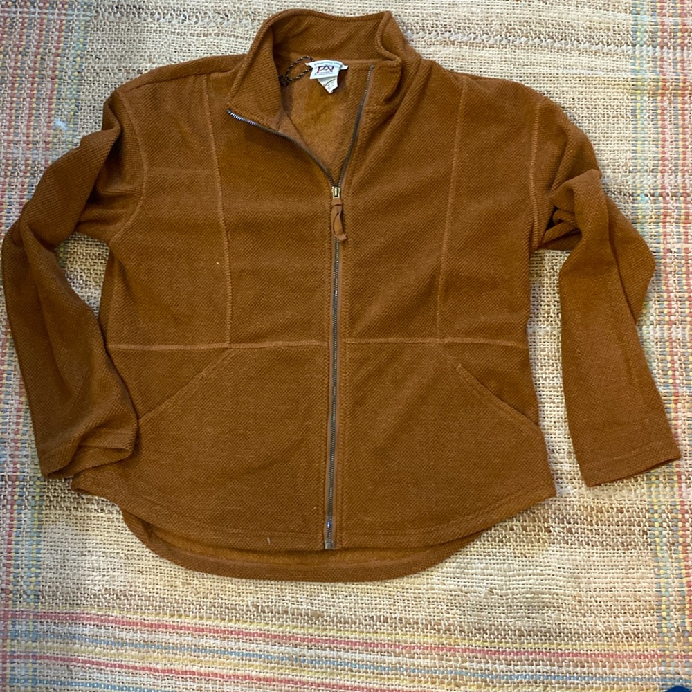 Ladies Avalanche, full zip jacket in a beautiful rust color